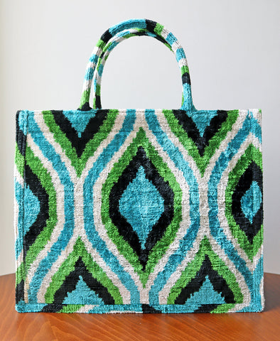 Our client targets fashion accessory enthusiasts with their online shop, featuring handwoven silk velvet ikat tote bags that embody unique design, artisan craftsmanship, and a blend of luxury and ethical fashion