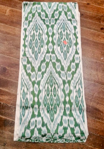 Silk ikat green fabric