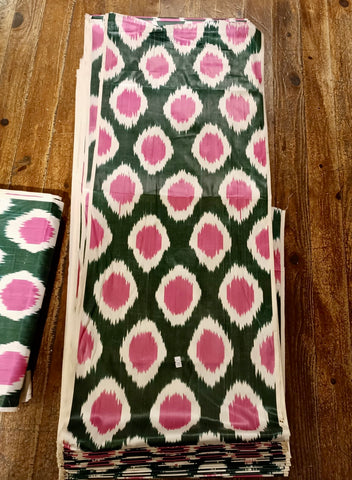 Handwoven silk ikat pink and green fabric