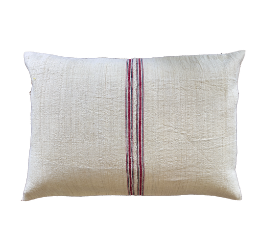 Authentic antique handwoven linen pillow cover featuring classic red heritage stripes. Handmade vintage textile for farmhouse, rustic and French country homes.