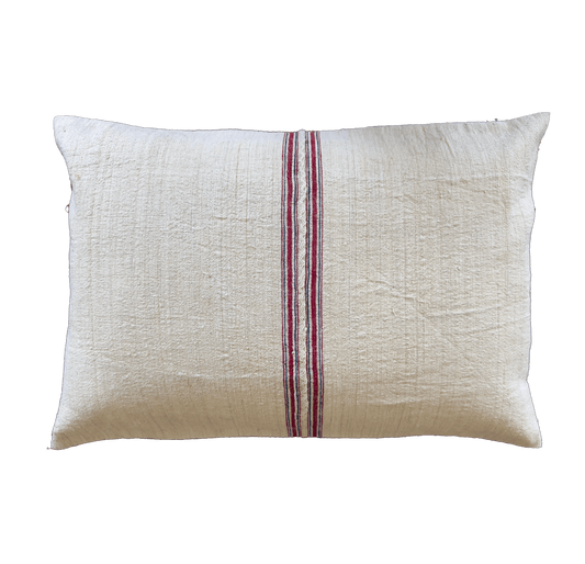 Authentic antique handwoven linen pillow cover featuring classic red heritage stripes. Handmade vintage textile for farmhouse, rustic and French country homes.