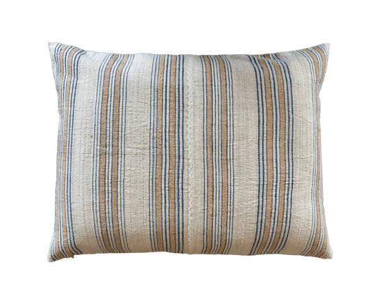 Decorative throw pillow with a linen fabric, featuring vertical stripes in beige, and blue on a solid white background.
