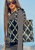 Explore the Black and White Moroccan Ikat Velvet Large Tote Bag. Crafted from luxurious silk velvet with striking Moroccan patterns. Ideal for everyday elegance or thoughtful gifting.