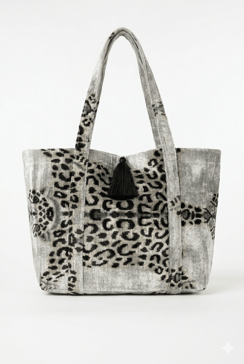 Tote bag with leopard print pattern on a white background