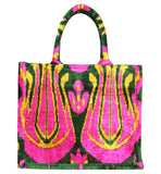 Shop Colorful and Luxurious Tote Bags for Women
Step into a world of vibrant fashion with our collection of luxury tote bags that combine elegance and functionality. Our colorful tote bags feature intricate ikat textile designs, adding a unique cultural flair to your wardrobe. From bold and vibrant velvet totes to timeless canvas tote bags, each piece is meticulously crafted to provide a statement look for any occasion.
Looking for the perfect bag to carry your essentials? Choose from our selection of larg