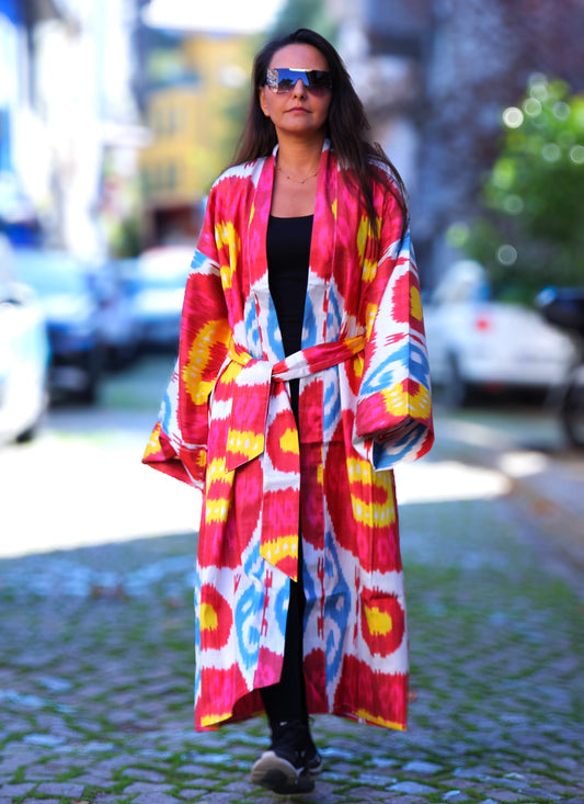 **Boho Collection** **Silk Ikat Kimonos** combine **traditional fashion** with bohemian flair. Perfect for **ikat dresses**, **ikat coats**, or beachwear, these handcrafted pieces offer timeless style for **wholesale orders** or unique collections.