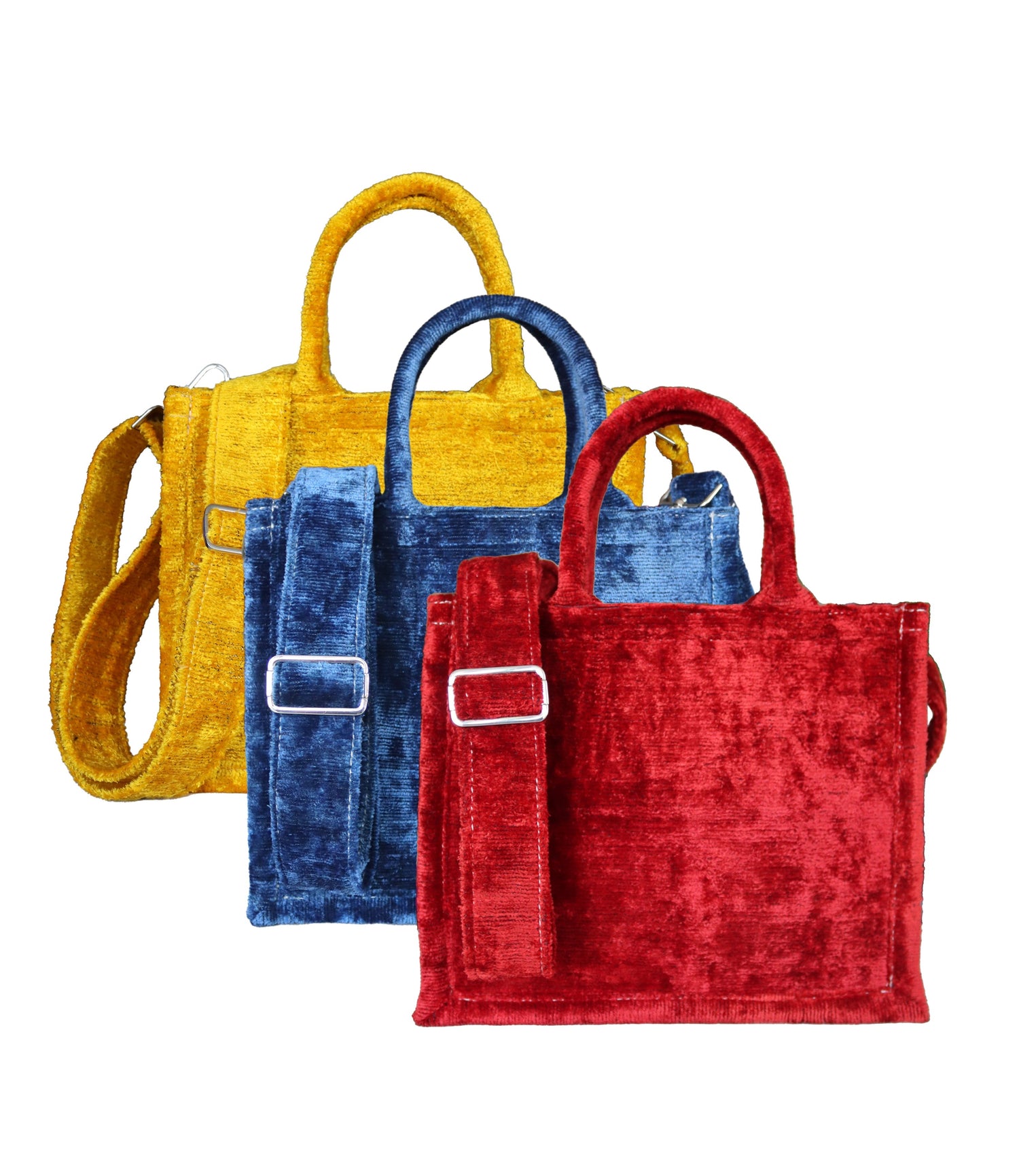 Silk Velvet Ikat Mini Tote Bags blend luxurious craftsmanship with vibrant silk velvet ikat fabric, making them elegant women’s accessories.