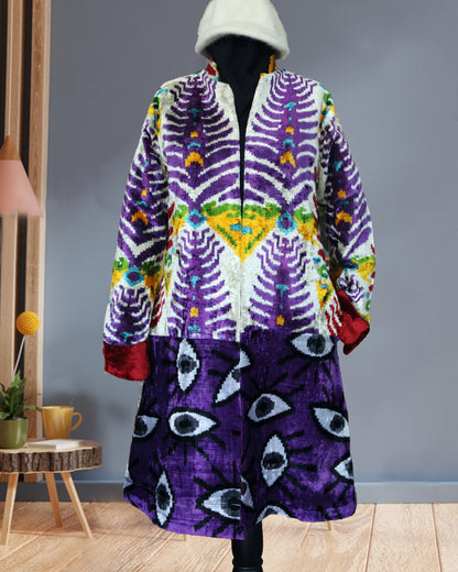 Discover our stunning silk velvet ikat coat, a perfect blend of traditional craftsmanship and contemporary style. This ikat coat features a unique patchwork design, making it a standout piece in your wardrobe. Ideal for both casual outings and elegant occasions, our ikat wear elevates your fashion game effortlessly. With its luxurious silk velvet fabric, this ikat caftan or ikat jacket ensures comfort while showcasing your individual style. Embrace the allure of unique fashion with our ikat patchwork jacket