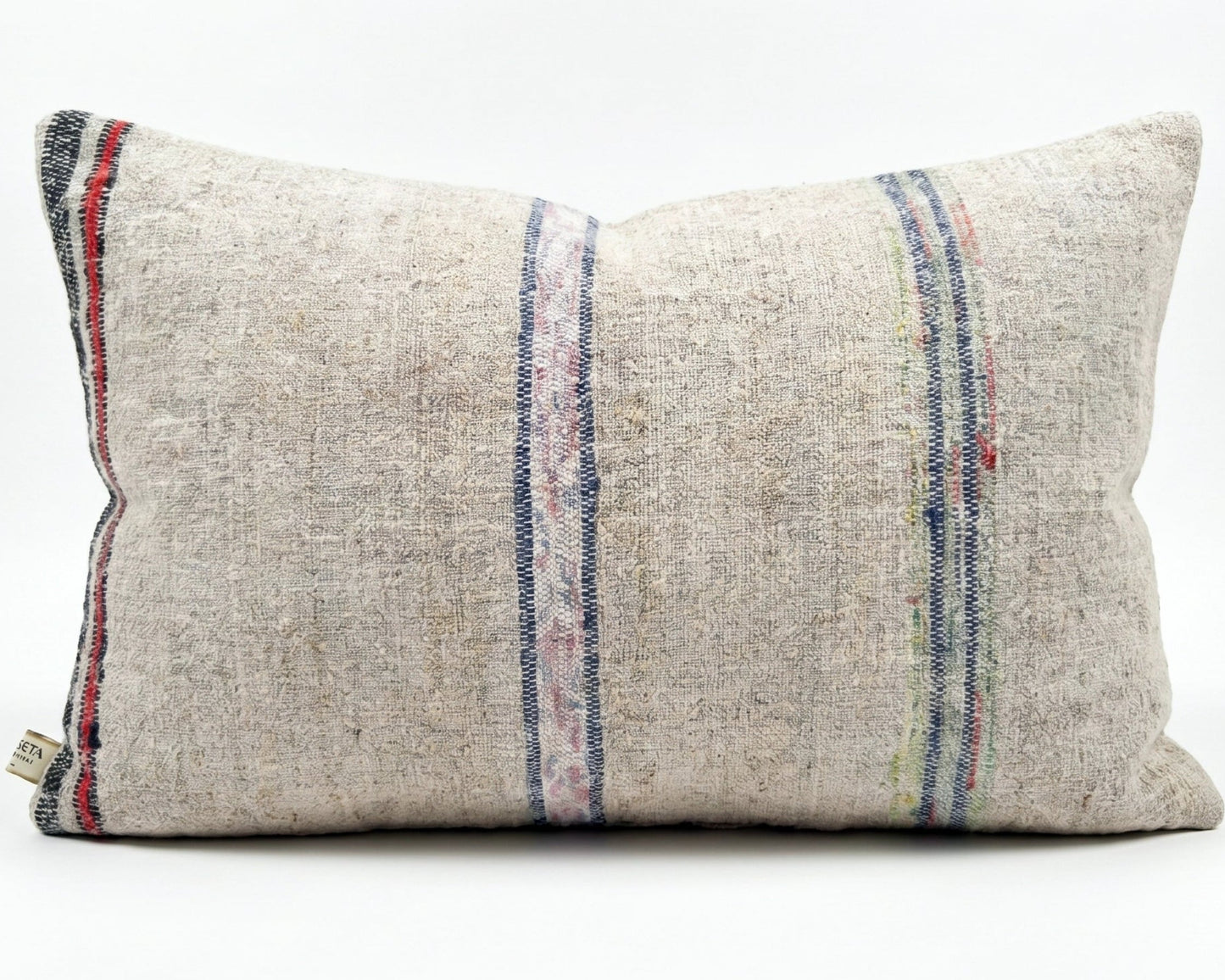 Antique Anatolian grain sack lumbar pillow with faded multi stripe handwoven linen textile