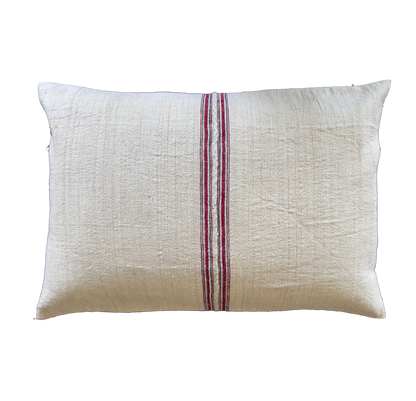 Authentic antique handwoven linen pillow cover featuring classic red heritage stripes. Handmade vintage textile for farmhouse, rustic and French country homes.
