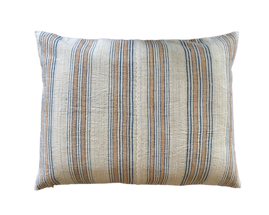 Decorative throw pillow with a linen fabric, featuring vertical stripes in beige, and blue on a solid white background.