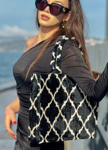 **Discover the Black and White Moroccan Ikat Velvet Large Tote Bag. Handmade with luxurious silk velvet and inspired by Moroccan design. Perfect for chic everyday style or unique gifting.**