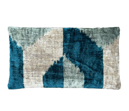 Handamde silk velvet ikat blue and gray pattern on a white background