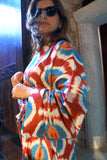 Handwoven silk ikat orange, red, blue kimono style caftan dress.