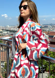 Handwoven silk ikat orange, red, blue kimono style caftan dress.