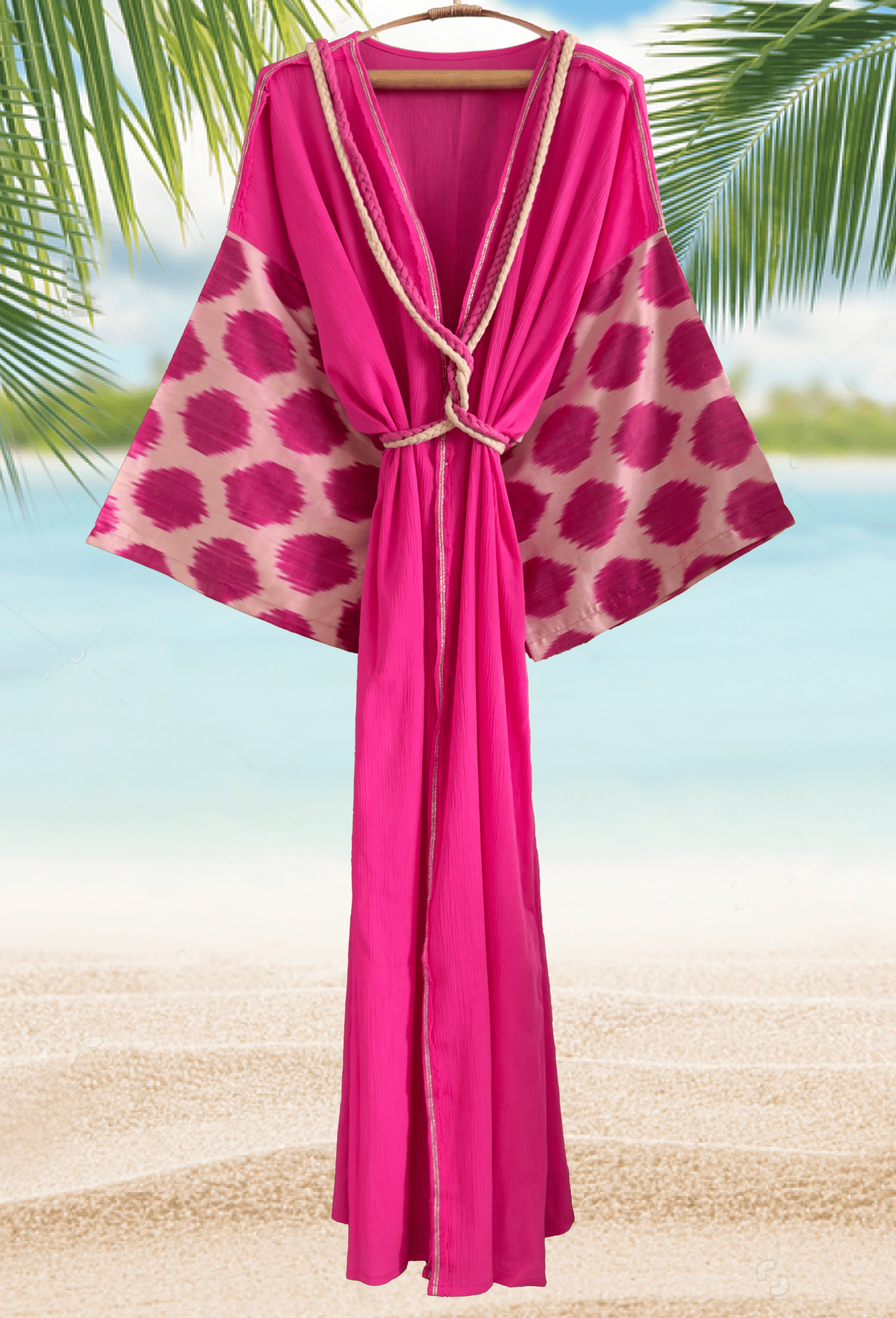 Hot pink beach cover-up with handwoven silk ikat polka dot details
