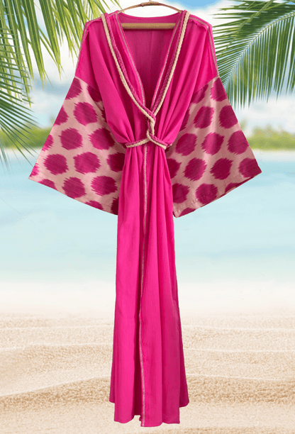 Hot pink beach cover-up with handwoven silk ikat polka dot details