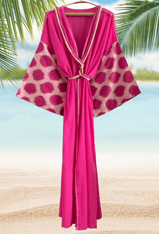 Hot pink beach cover-up with handwoven silk ikat polka dot details