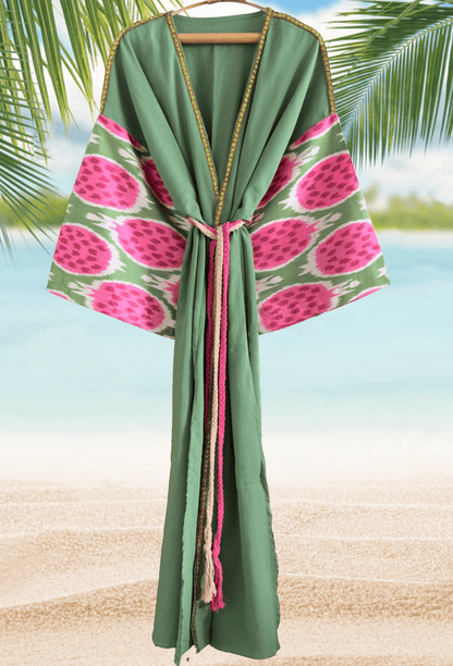 Luxury beach cover-up with handwoven silk ikat pomegranate design and decorative trim
