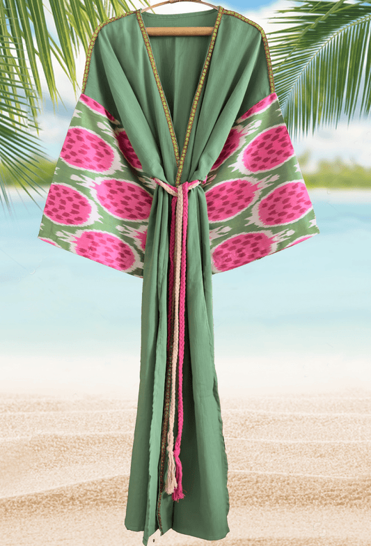 Luxury beach cover-up with handwoven silk ikat pomegranate design and decorative trim