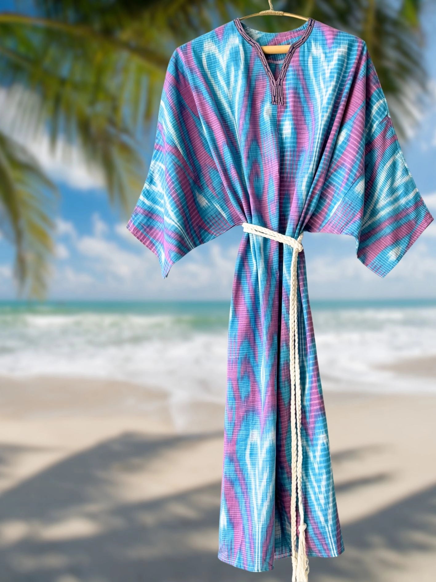 Handmade light blue and pink ikat caftan dress, lightweight cotton summer caftan for resort and holiday wear.