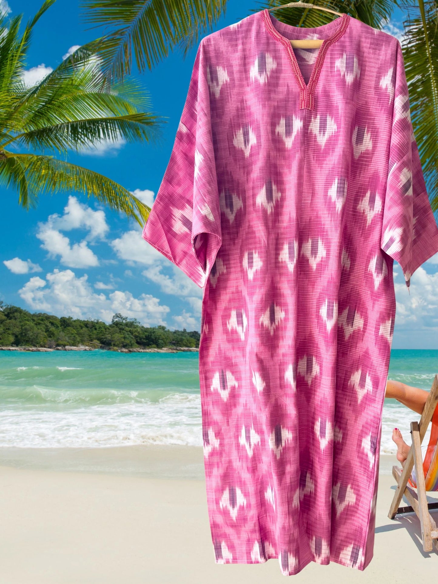 Artisan pink and white cotton ikat caftan dress featuring handwoven details and breathable summer fabric.
