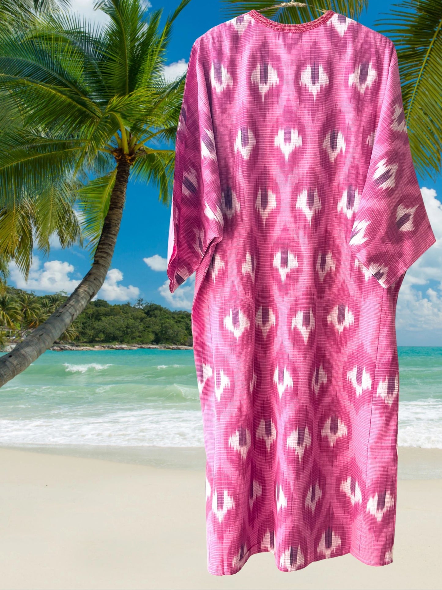 Light cotton ikat caftan dress in pink and white, one-size fit with authentic handwoven texture.