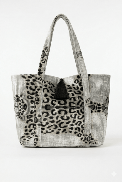Tote bag with leopard print pattern on a white background