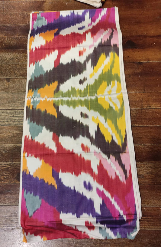 Buy Uzbek Multicolor Ikat Silk Fabric by Meter or Yard – Vibrant Patterns and High-Quality Silk for Fashion, Upholstery, and Craft Projects.