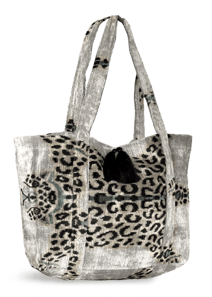 Tote bag with leopard print design on a white background