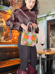 Whether you're looking for a stylish everyday bag or a special boho gift, this Handmade Petite Velvet Tote with its striking ikat pattern is the perfect choice. Don't miss out on adding this luxurious velvet mini tote to your collection!