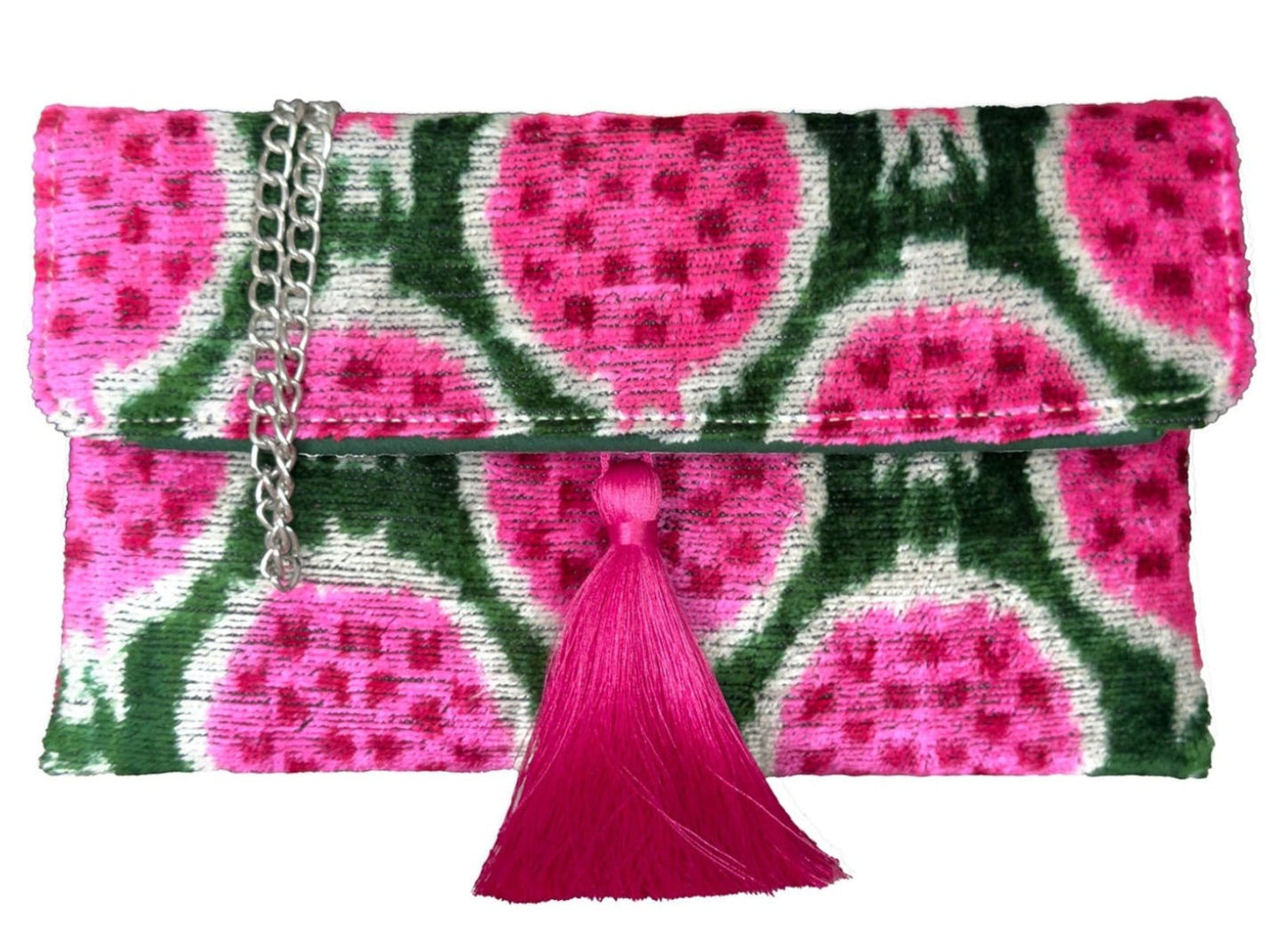 Silk velvet ikat clutch featuring handwoven velvet, pink pomegranate motifs, chain strap and luxury tassel