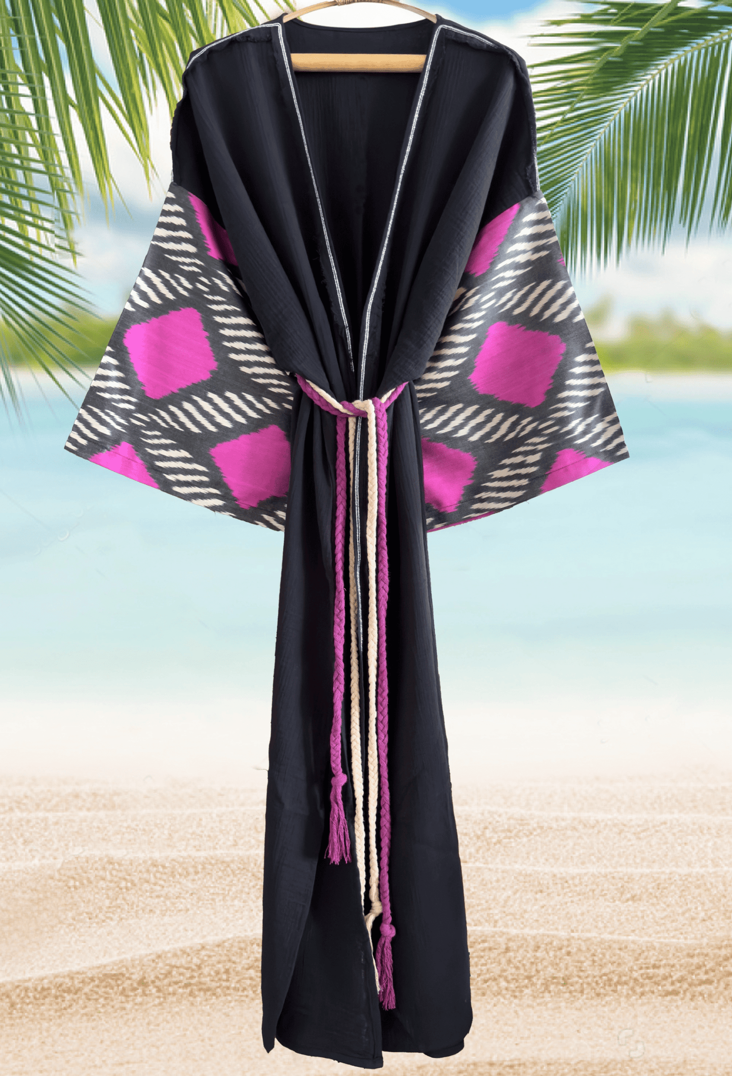Handwoven silk ikat kimono robe with black double gauze muslin base and vibrant fuchsia sleeve detail – women's boho beach cover up