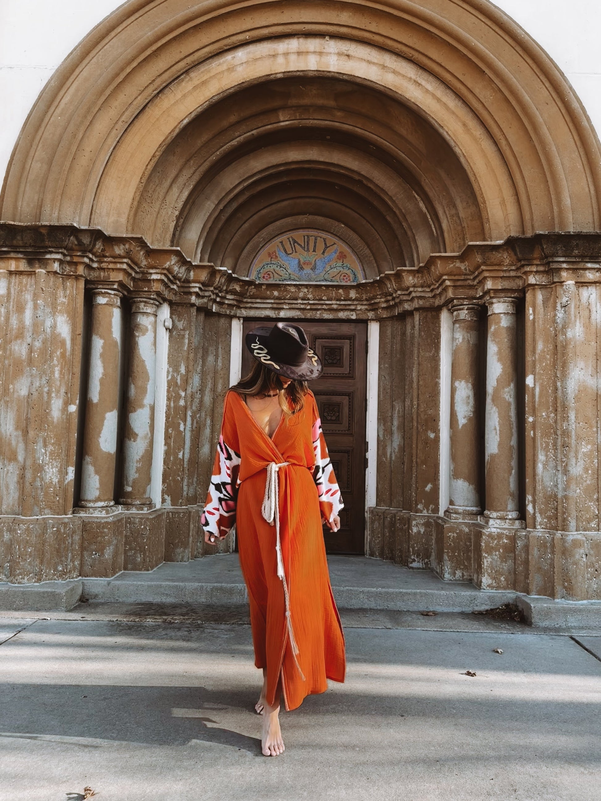 Burnt orange muslin kimono robe with heart shaped pink silk ikat sleeves