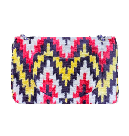 Colorful patterned pouch with a zipper on a white background