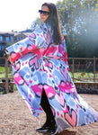 Silk ikat kimono caftan is a perfect blend of handmade artistry and traditional craftsmanship, showcasing the beauty of handwoven fabrics. This elegant piece features intricate ikat patterns, embodying the essence of boho style and ethnic fashion. Made from luxurious silk, the silk ikat kimono offers both comfort and sophistication, making it suitable for various occasions. Whether you're dressing up for a special event or looking for a stylish addition to your everyday wardrobe, this ikat caftan is the ide