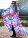 Silk ikat kimono caftan is a perfect blend of handmade artistry and traditional craftsmanship, showcasing the beauty of handwoven fabrics. This elegant piece features intricate ikat patterns, embodying the essence of boho style and ethnic fashion. Made from luxurious silk, the silk ikat kimono offers both comfort and sophistication, making it suitable for various occasions. Whether you're dressing up for a special event or looking for a stylish addition to your everyday wardrobe, this ikat caftan is the ide