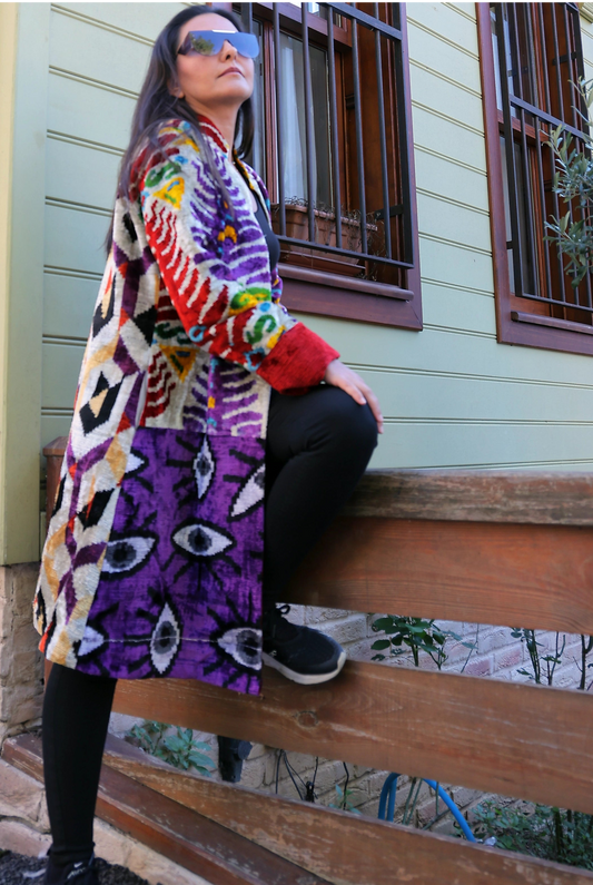Silk velvet ikat coat, ikat coat, ikat wear, ikat caftan, ikat jacket, ikat patchwork jacket, and luxury wear define our stunning collection piece that merges traditional craftsmanship with contemporary style. This ikat coat features a unique patchwork design, making it a standout addition to your wardrobe. Ideal for both casual outings and elegant occasions, our ikat wear effortlessly elevates your fashion game. With its luxurious silk velvet fabric, this ikat caftan or ikat jacket ensures comfort while sh