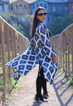 Get ready for Black Friday with our exquisite handwoven silk ikat caftan, a perfect ikat dress for gifting. Crafted using traditional Uzbekistan ikat woven techniques, this stunning ikat wear features bell sleeves, side and sleeve slits, and pockets on both sides. Available in elegant black and grey, this ikat caftan beautifully blends bohemian style with ethnic charm, making it the ideal gift for anyone who appreciates unique ikat fashion. Embrace the artistry of handmade ikat clothing and make a statement