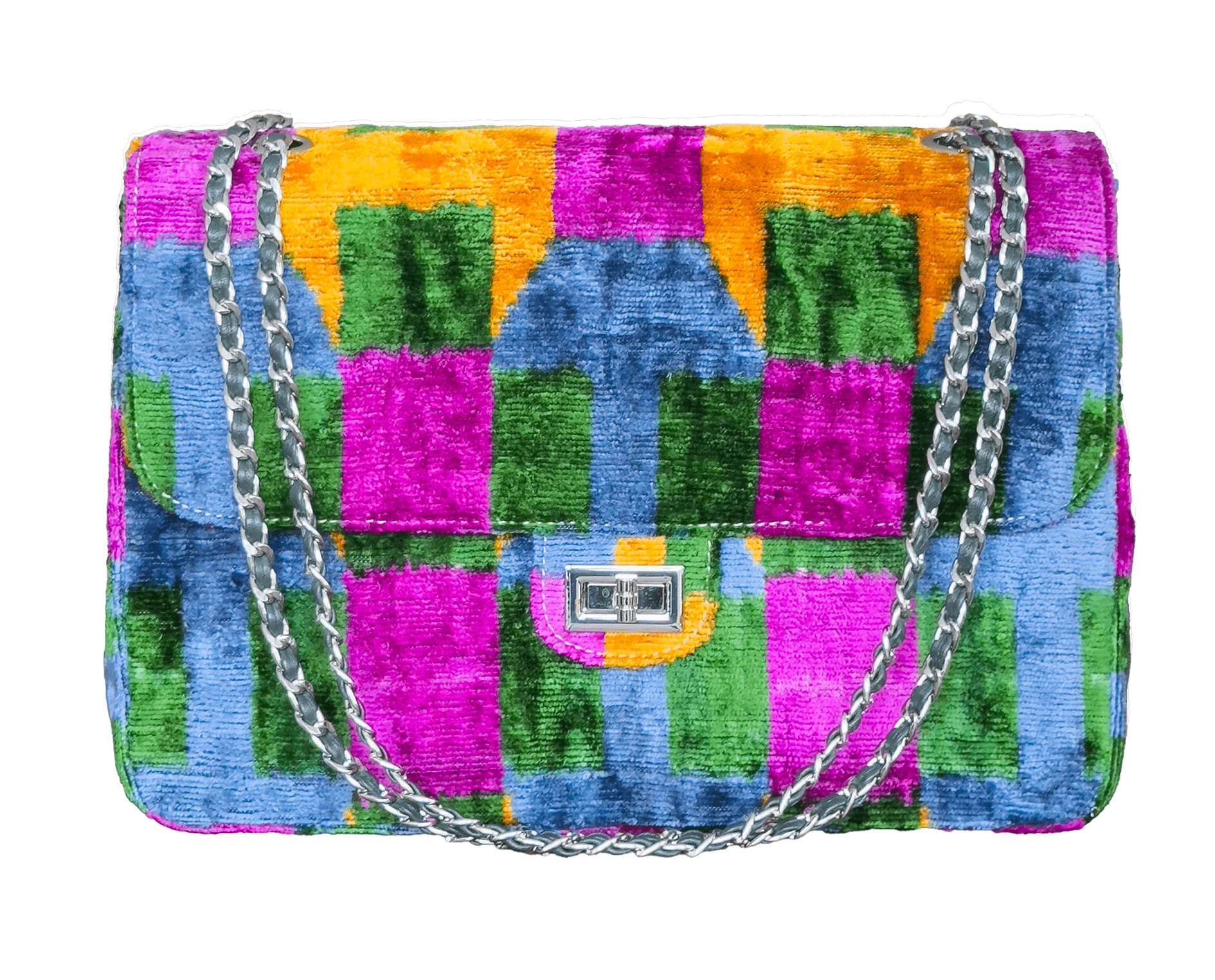 Luxury silk velvet ikat jumbo bag featuring bold multicolor patterns, handcrafted quality, and a chic chain strap. The perfect statement designer handbag for elevating any outfit with timeless artisanal elegance.
