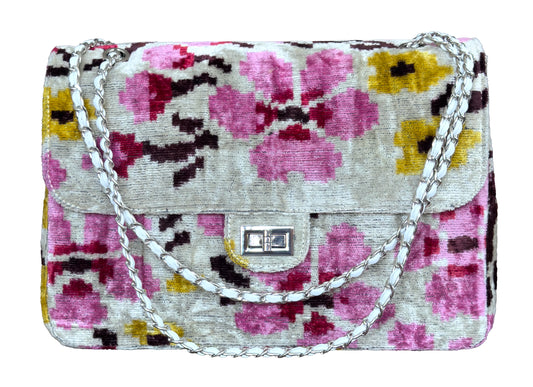 Silk velvet ikat jumbo coco bag floral patterned handbag with a chain strap on a white background