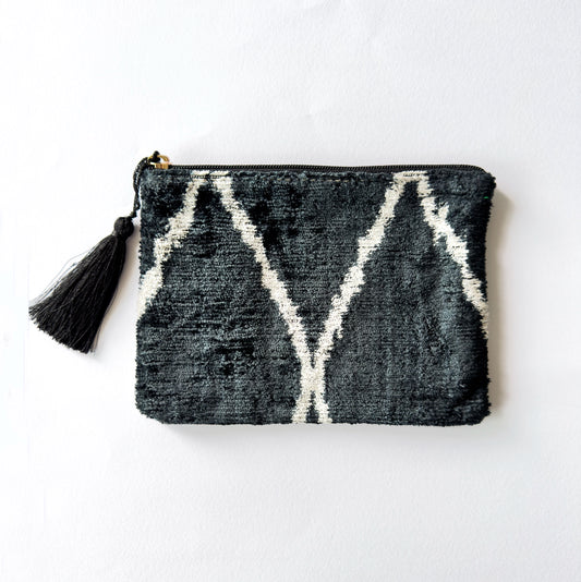 Authentic Ikat Artistry: Hand-loomed Silk Velvet Black with a unique, luxurious pattern.
