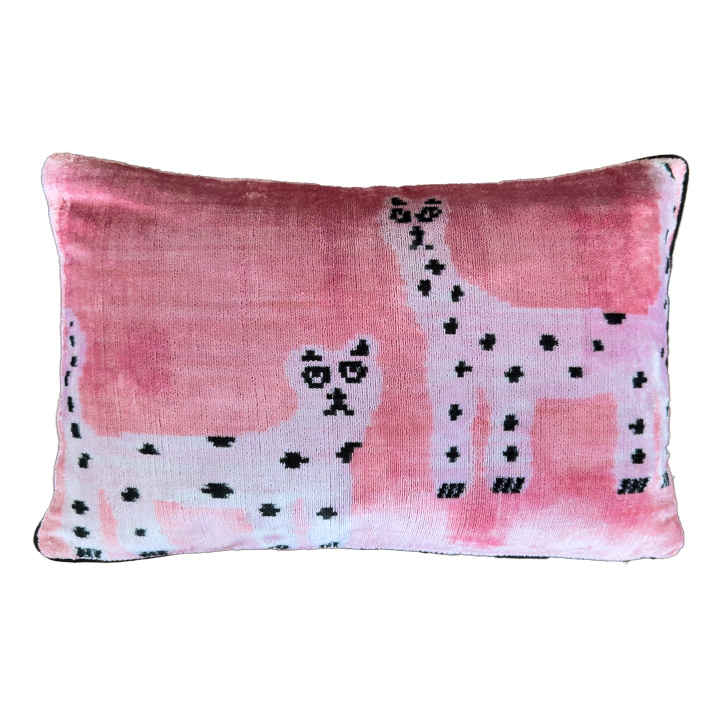 Wholesale handwoven silk velvet ikat cushion cover in pink with authentic ikat pattern, luxury decorative pillow cover for boutiques and home décor stores.