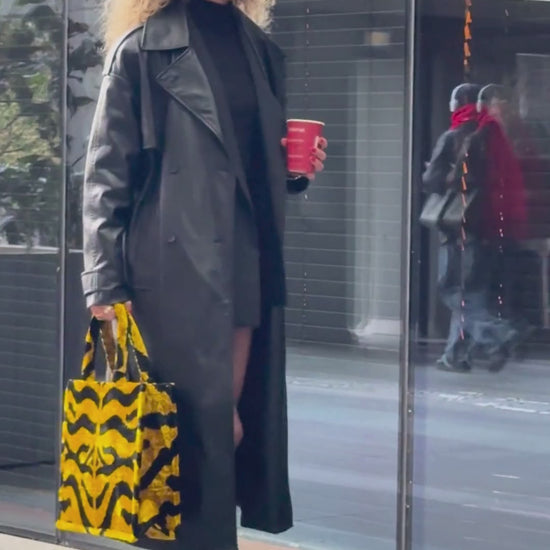 Golden Tiger Silk Velvet Ikat Large Tote Bag – handcrafted with luxurious silk velvet and featuring a bold tiger-stripe pattern. Perfect for adding a statement to your everyday style. Free EU shipping!