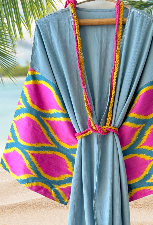 Azure blue muslin kimono robe with pink and yellow silk ikat sleeves