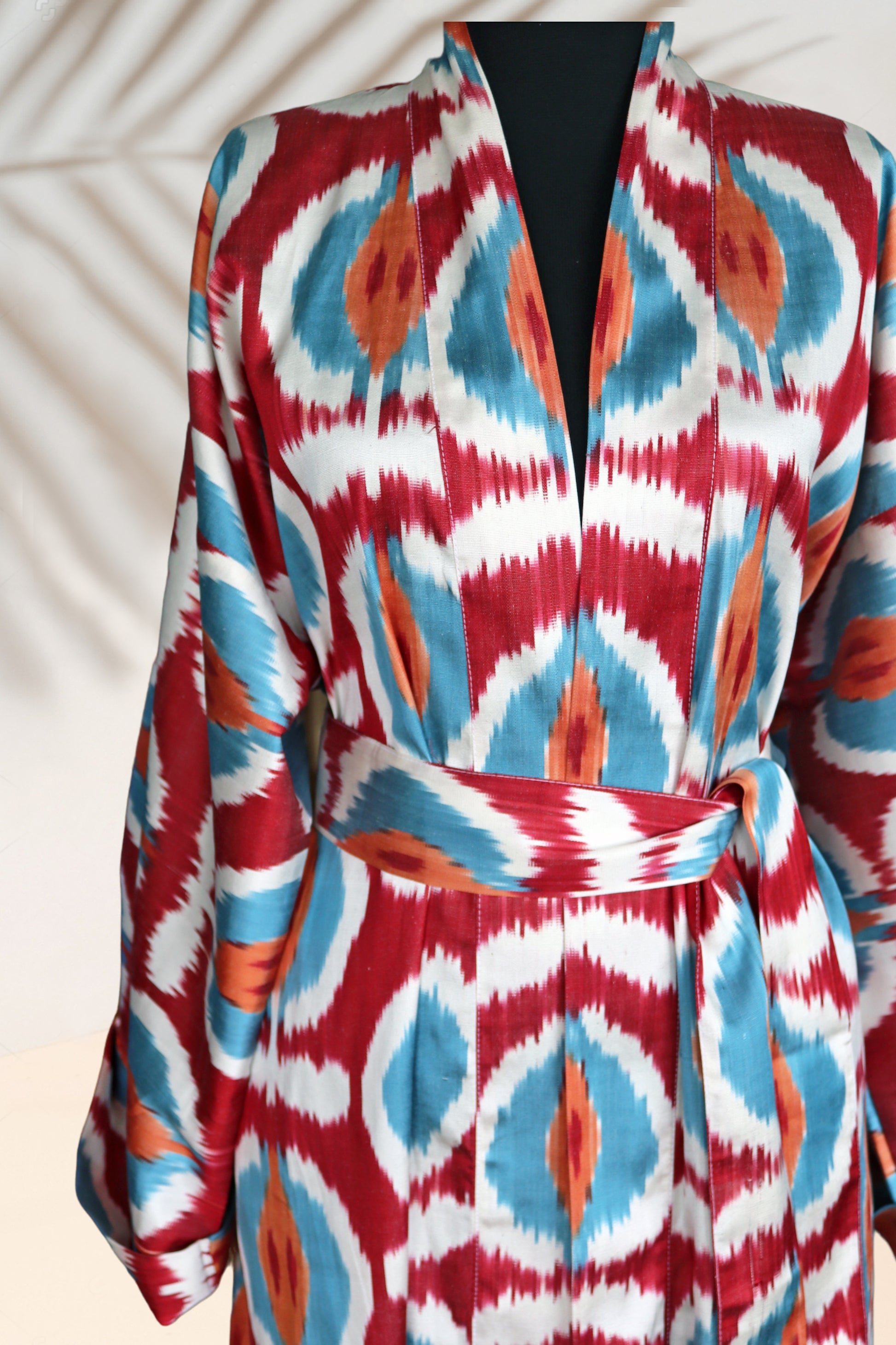 Handwoven silk ikat orange, red, blue kimono style caftan dress.