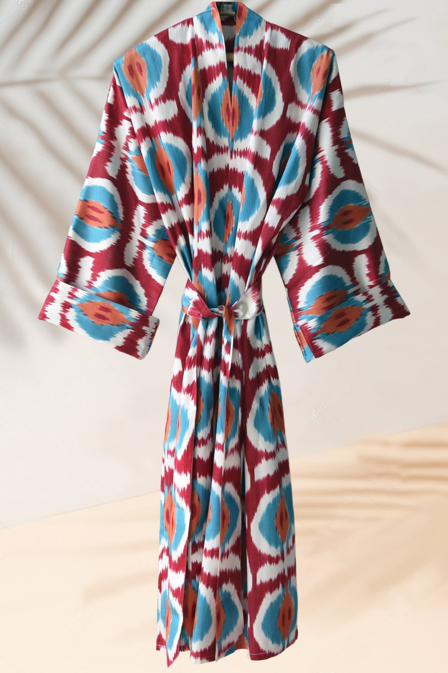Handwoven silk ikat orange, red, blue kimono style caftan dress.