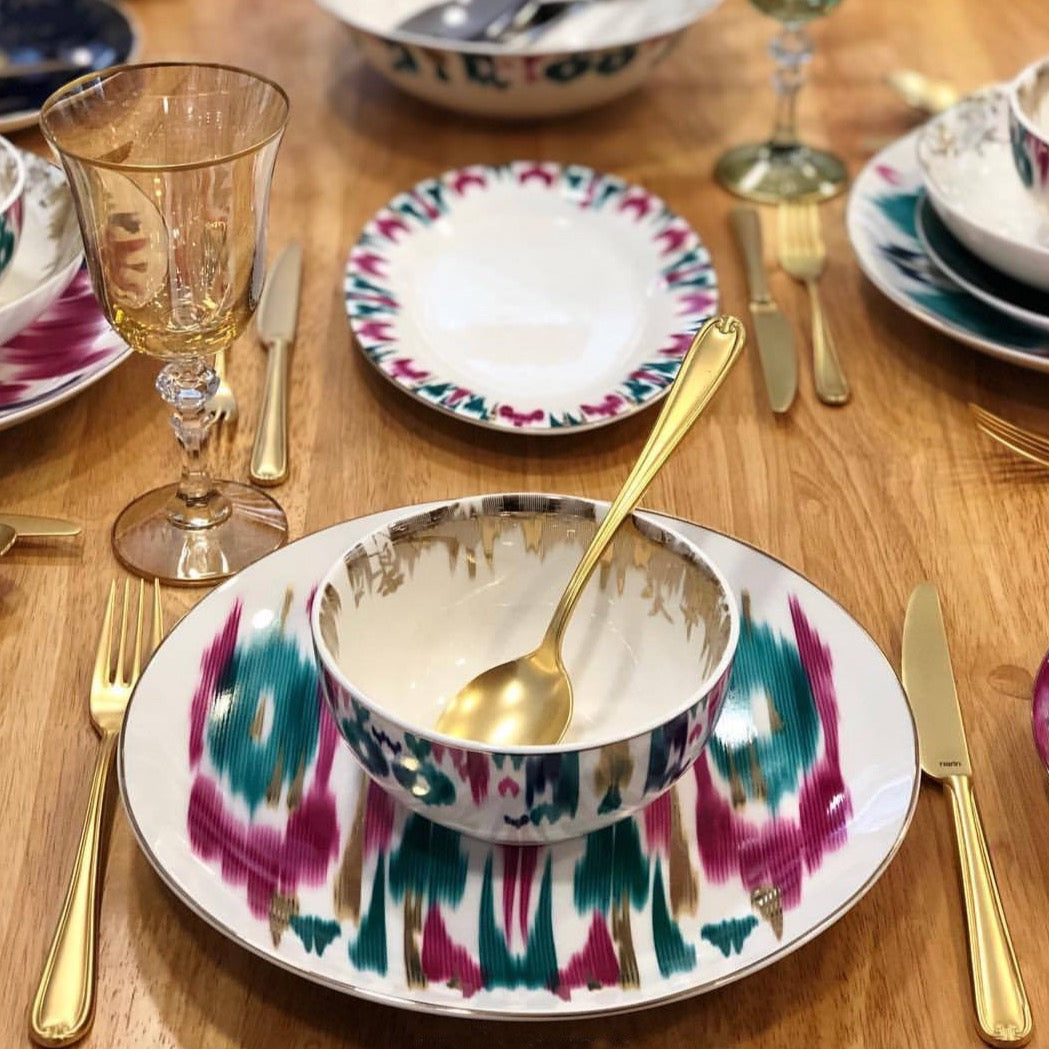 porcelain service plates of set with ikat print